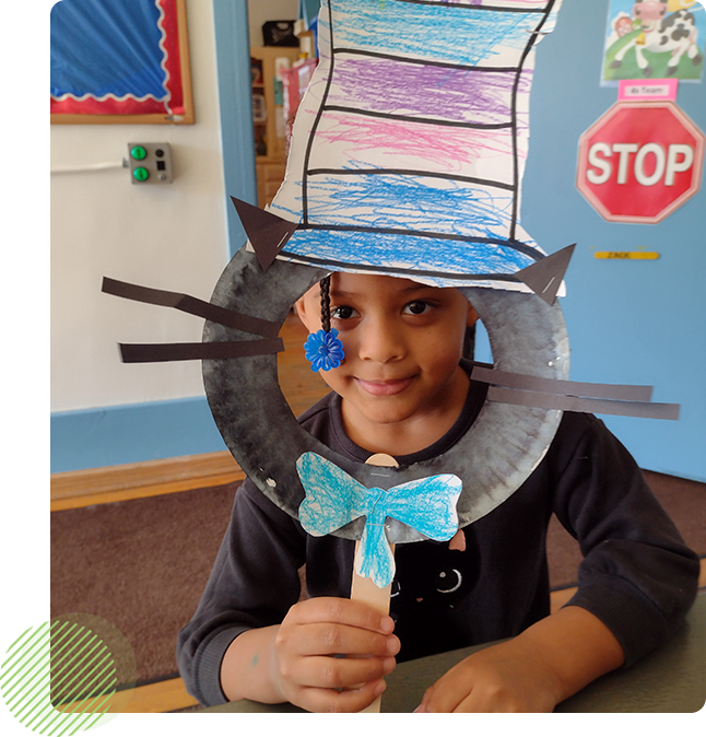 A child with a cat hat and bow tie.