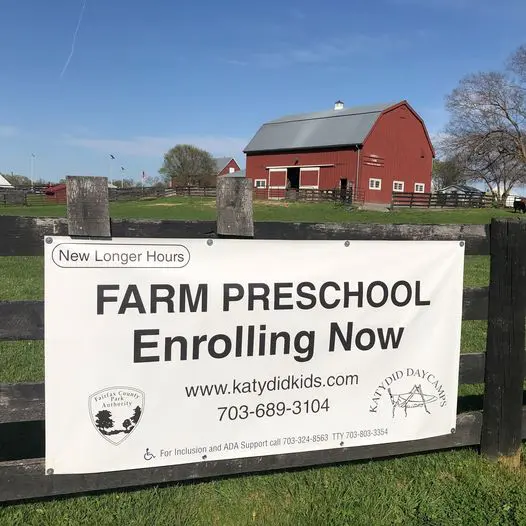 A sign that says farm preschool enrolling now.